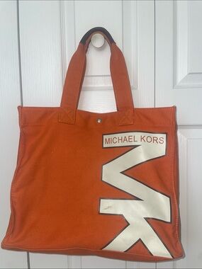 Michael Kors Orange Canvas Messenger Tote with Bold MK Logo